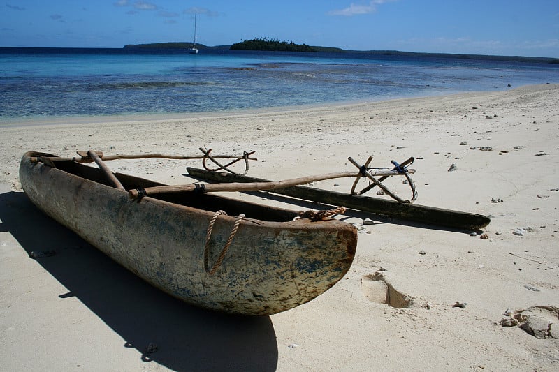 Polynesian canoe on beach