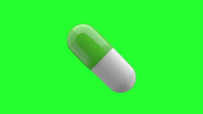 白绿色药片孤立。绿色屏幕，4K超高清。3 d渲染。