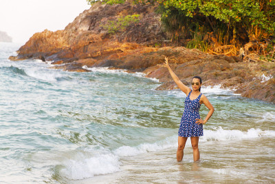 Woman happy with wave morning in Lonely Beach at b