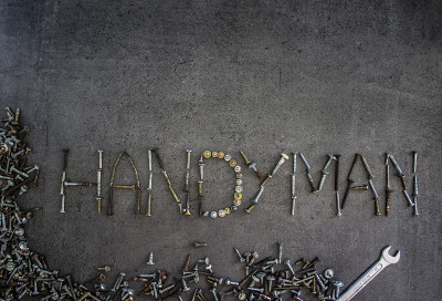 Word handyman made of bolts