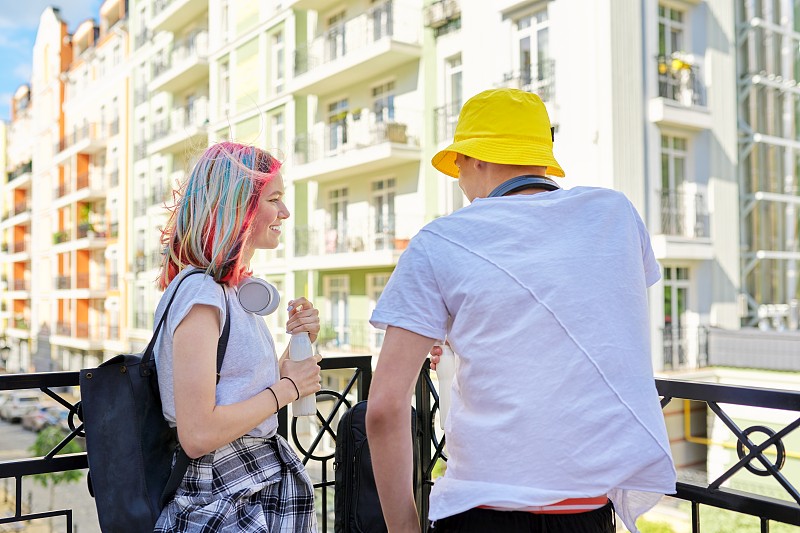 Urban lifestyle of teenagers, couple of college st