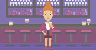 Woman holding glass of juice