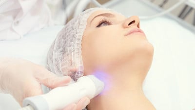 Facial micro current cosmetology procedure. Beauty