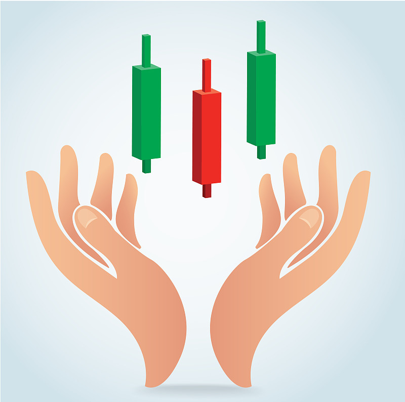 hand holding candle stick graph chart of stock mar