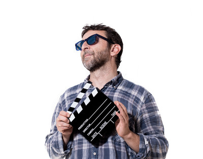 一个男人演员与电影拍板