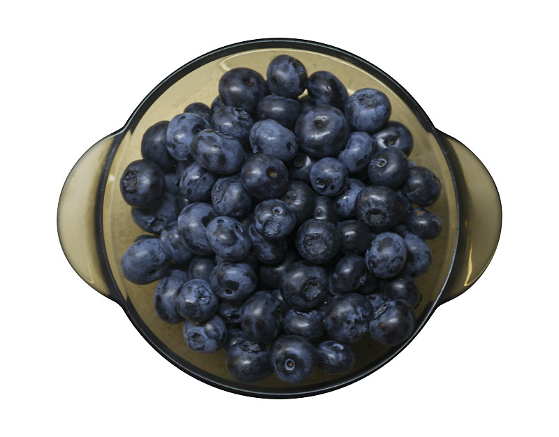 Fresh blueberry in a bowl isolated on white