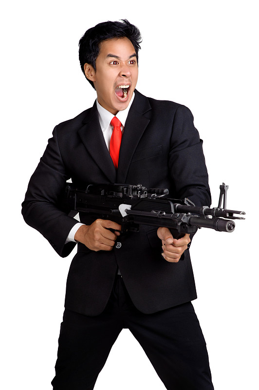 商人手持机关枪孤立射击_ …