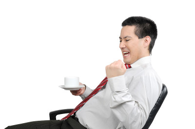 享受商人与一杯咖啡