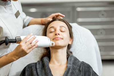 Woman during a laser rejuvenation treatment
