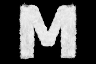 字母M字体形状元素组成的云上黑色