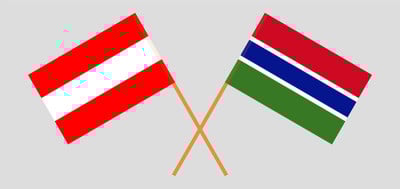 Crossed flags of Gambia and Austria