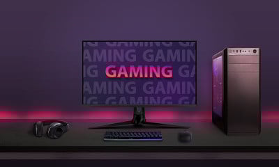 现代桌面游戏设置在书桌与led灯的背景。电脑显示的现代游戏字体概念