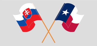 Crossed and waving flags of the State of Texas and