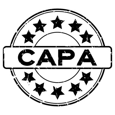 垃圾黑色CAPA(纠正措施和预防措施的缩写)字与星形图标圆形橡胶印章印章在白色背景