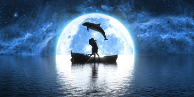 dolphin jumping over a boat with kissing people on