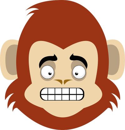 矢量表情插图的猴子的头与快乐的表情，微笑显示所有他的牙齿