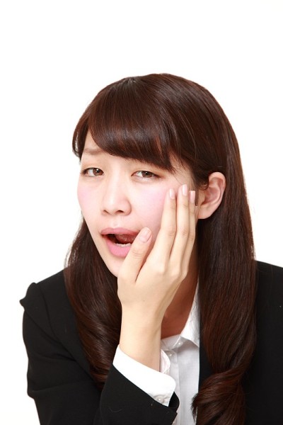 女商人牙痛