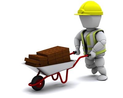 用手推车运砖的建筑工人