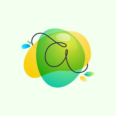 字母A标志放置在绿色水彩斑点上。