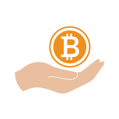 带有比特币符号和手的金币。股票插图