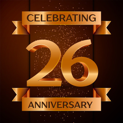 现实的26周年庆典设计横幅。金色数字，五彩纸屑和缎带在棕色的背景。彩色矢量模板元素为您的生日派对