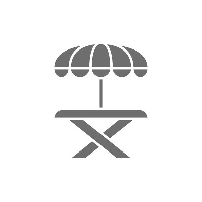 街头野餐桌上有伞灰色图标。