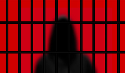 现实的囚犯在一个Hood剪影与监狱的栅栏。矢量图