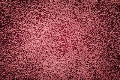 Dark red background from a soft upholstery textile