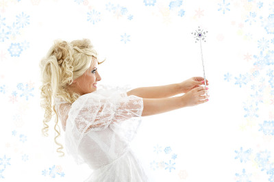 仙女拿着魔杖和雪花