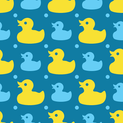 Seamless pattern with yellow rubber ducks on a blu