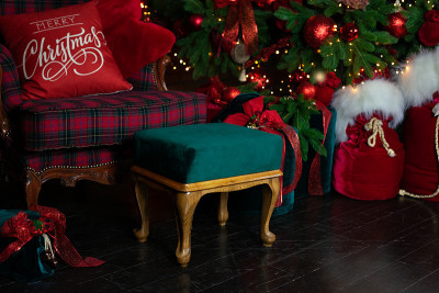 Stylish Checkered armchair with green pouf. Cozy a
