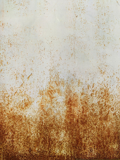 腐蚀金属的背景。锈迹斑斑的金属背景。锈渍。Rystycorrosion。