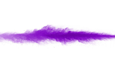 粉末爆炸。一个紫色尘埃粒子爆炸的特写，孤立在白色上。
