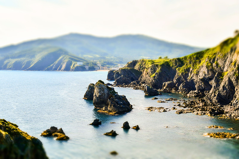 海洋和岩石，照片作为背景，圣胡安de Gaztelugatxe巴斯克地区西班牙