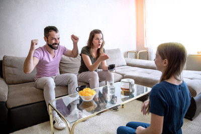 Playing guessing game with parents at home