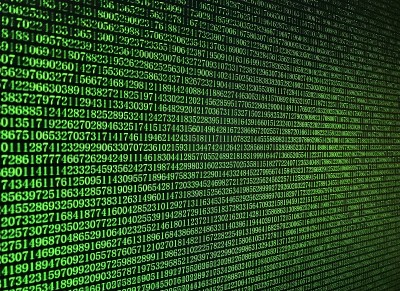 数字代码以电脑屏幕为背景，金色数字以黑色背景显示电脑屏幕