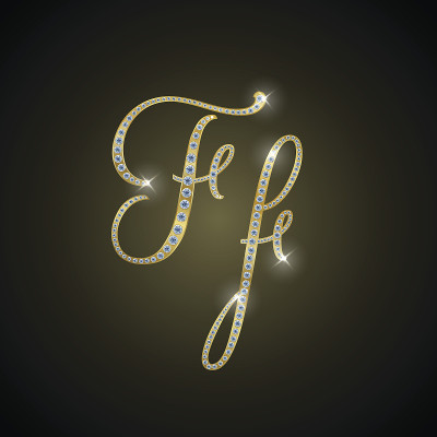 闪亮的字母“F“由黄金和钻石组成