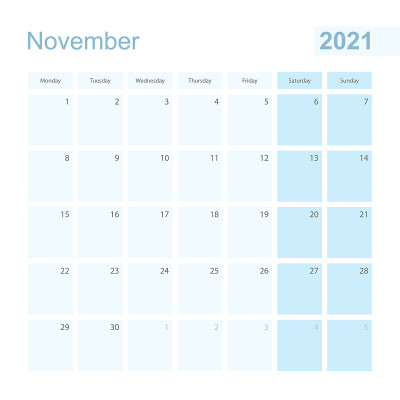2021年11月蓝色粉笔色的墙壁计划器，周一开始一周。