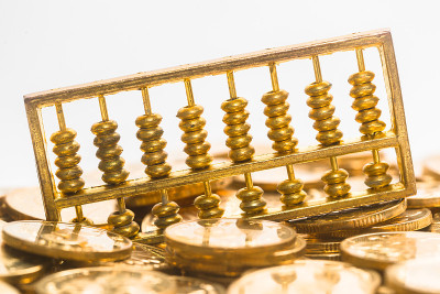 金算盘放在金币上