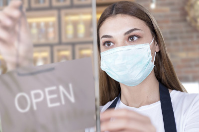 businesswoman reopening shop