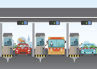 驾车者在高速公路收费站缴纳公路通行费。
