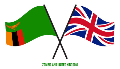 赞比亚和英国旗帜交叉和挥舞的平风格。官方的比例。正确的颜色