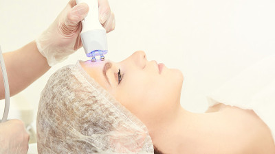 Facial micro current cosmetology procedure. Beauty
