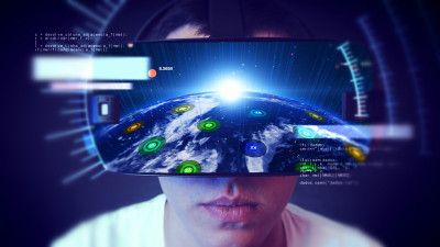 帅气的年轻人戴着VR头戴体验虚拟现实。