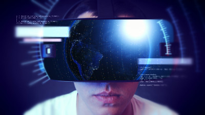 帅气的年轻人戴着VR头戴体验虚拟现实。