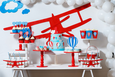 Candy bar on boy's birthday party with a lot of di