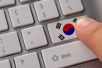 Male hand pressing keyboard button with flag of So