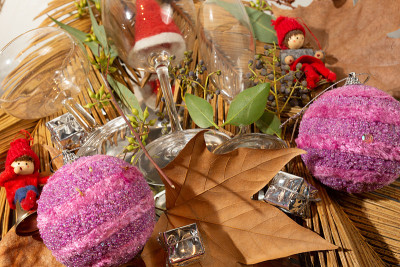 christmas still life with dolls and pink decoratio