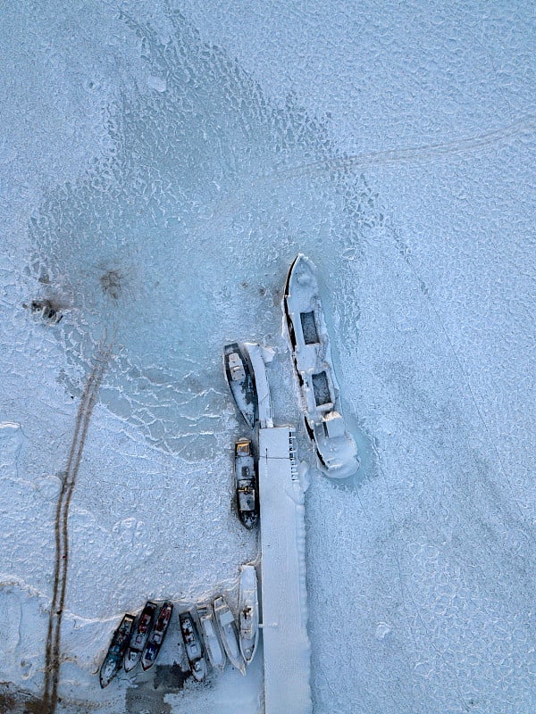 Aerial photo of ships in frozen Baikal lake in win