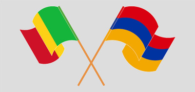 Crossed and waving flags of Mali and Armenia